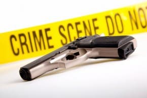 Handgun and Crime Scene Tape